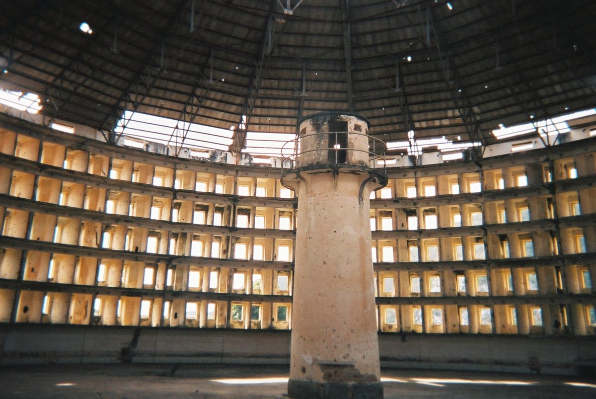 Interior of a panopticon cell block: the central watchtower surrounded by five tiers of cells